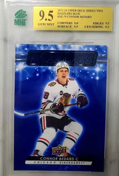 Conner Bedard Graded blue Dazzlers Rookie card. Graded MNT 9.5 Rookie of the year! Comes from smoke...