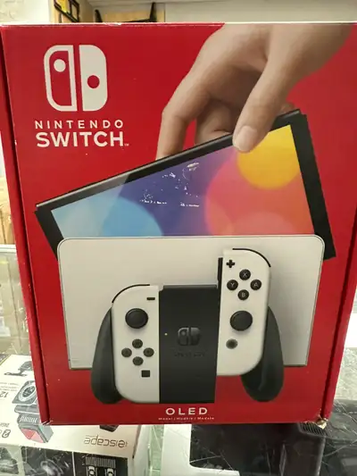 NEW NINTENDO SWITCH OLED WHITE CONSOLE IN THE BOX $359, View more