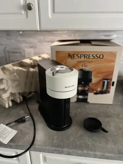 LIKE NEW Nespresso Vertuo Next Open Box - Lightly Used - Like New Model: GCV1 Description: With 7 cu...