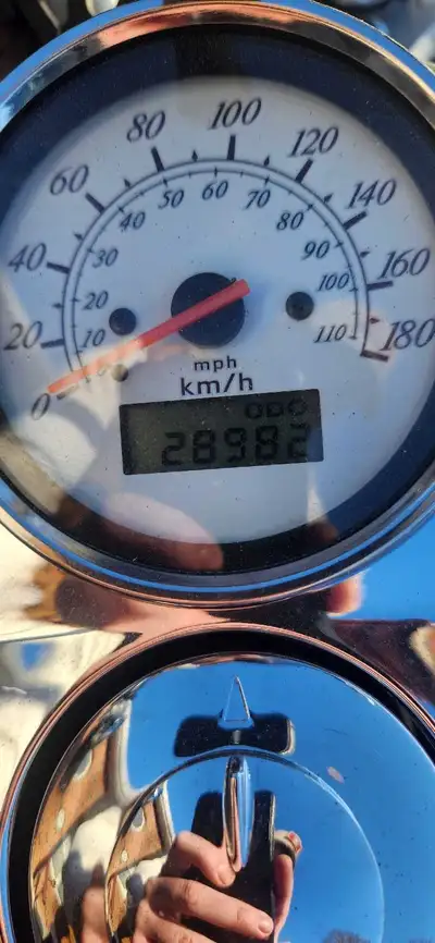 3000 obo hard bags and mini apes jetted carb. Full aftermarket exhaust very loud.