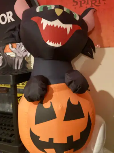 Cat coming out of pumpkin inflatable , View more