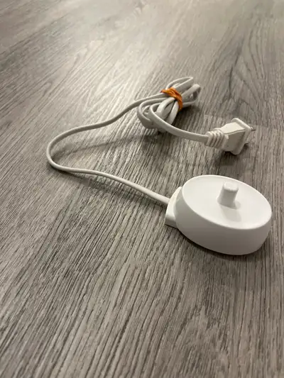 Get your Oral-B electric toothbrush charged up with this replacement charging base! This base is com...