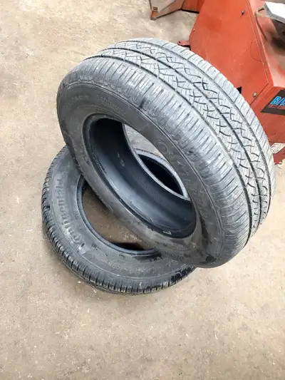 Pair of 225/65R16 Continental tires in great shape. Lots of tread left. $75 obo