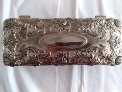 A nice vintage metal silver plated jewelry box. It is in perfect condition. I did not polish it as i...
