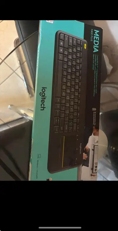 I am selling a brand new, in-box Logitech K400 Plus Wireless Touch Keyboard, which allows you to con...