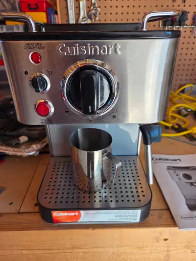 Barely used(only once or twice) Cuisinart Espresso Machine with foam frother and steamer.