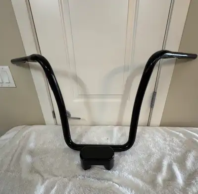 I have a set of brand new Carlini Ganster apes 16” x 1.25” for older softail and Dynas with the cabl...