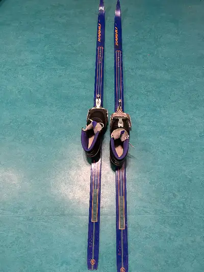 Kahru skis(150) and boots(size 4 or 5-no size visible but my daughter is now a six).