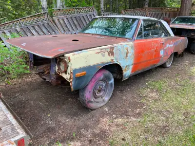 If the adds up,still available Prince George BC. Two,1970 Dodge Dart Swingers both in my name, origi...