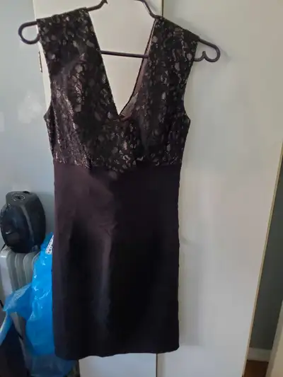 Lace upper, nicely lined, Zip up at back,meant to be slim fitting