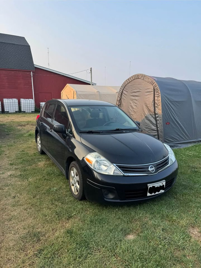2010 Nissan Versa Hatchback in Cars & Trucks in St. Catharines