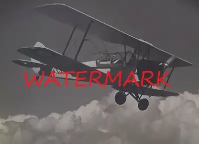 WWII DE HAVILLAND TIGER MOTH BI-PLANE FLYING, c1943-6, View more