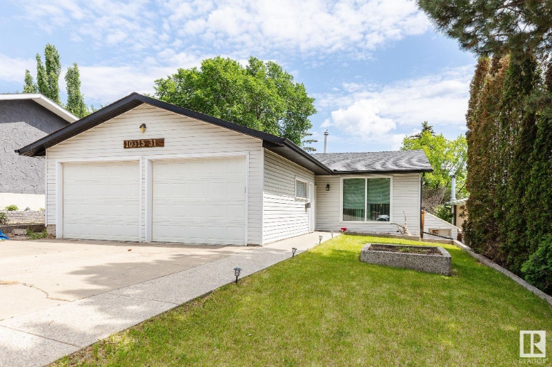 BEAUTIFUL Hillside Bungalow with WALKOUT BASEMENT in Rundle Houses