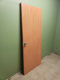 Wooden doors complete with aluminum frame system and knobs