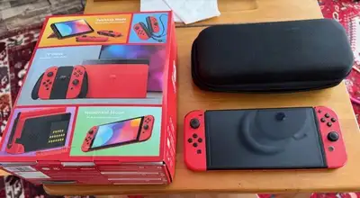 Nintendo Switch OLED Edition Spéciale Mario Rouge, View more