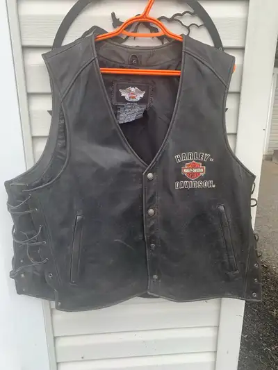 Leather Harley Davidson motorcycle vest XL, very good condition. Call 902-680-5418