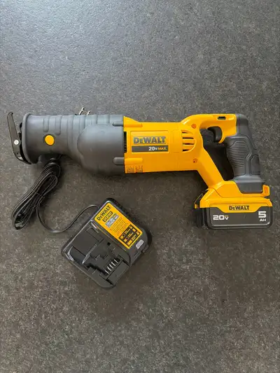 Dewalt 20v Sawzall with 5ah battery and charger. In new condition, used only once. I upgraded. Askin...