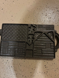 Cast iron gingerbread house mold 
