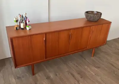Modern teak sideboard designed by Gunni Omann, View more
