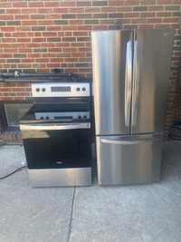 Almost NEW stainless steel fridge and glass top stove set 