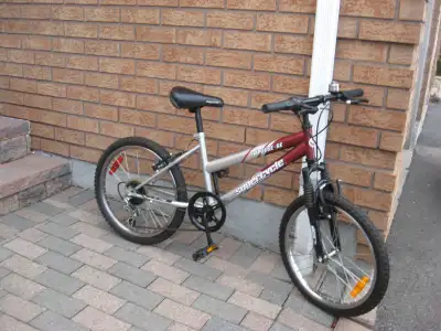 Two 5 speed 20" Supercycle Impulse youth bikes, View more