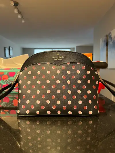 Kate Spade dome crossbody payton fiesta dot bag. Used only a few times and has been let in a closet...