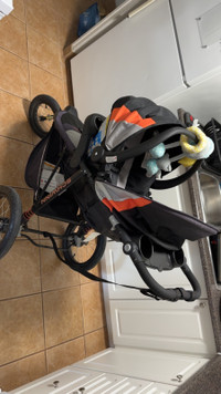 Jogging stroller and 2 car seats 
