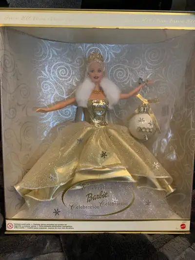 This is a beautiful, new in box, 2000 Special Edition Celebration Barbie doll. This Barbie is dazzli...