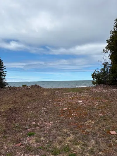 525 feet of pristine waterfront. No mud or weeds. Faces due west. It’s got amazing sunsets. 2 drivew...