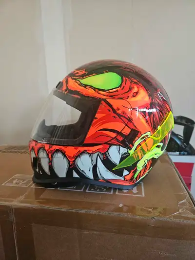 Icon motorcycle helmet is in never worn condition. Size large. $200 obo If the ad is up, yes, it's s...