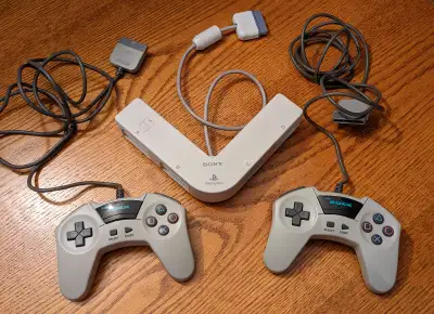 PS1 4 player multi tap adapter + 2 controllers, View more
