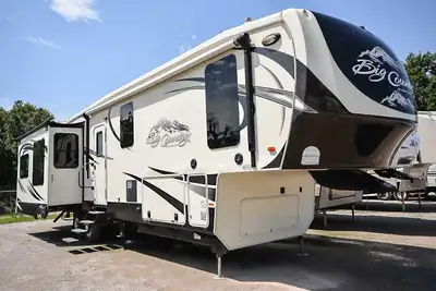 I'm selling a spacious 42-foot Big Country 2015 fifth wheel, perfect for comfortable living on the r...