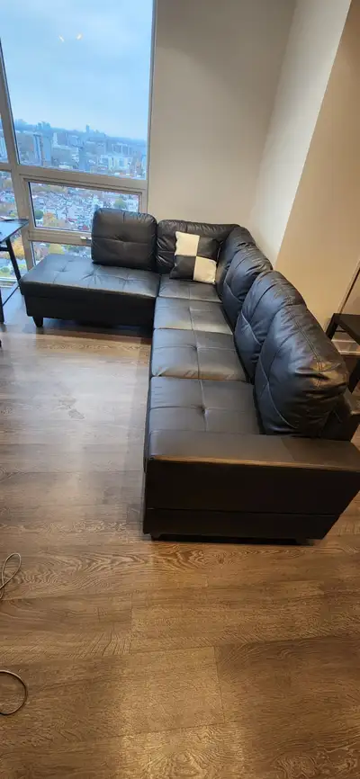 Black faux leather sectional sofa, View more