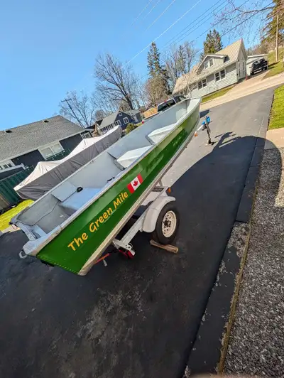 89' sea nymph tin boat 14 foot. 63" beam. .Shore landr trailer All new paint last season (interior o...