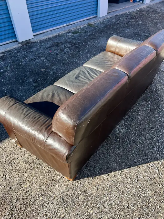 Brown leather natuzzi sofa64346711217539123