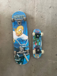 2 skateboards in Used Condition mini and regular board 