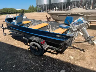 1980 14’ Evanol boat with home built trailer and 9.9hp Suzuki motor with electric start. Comes with...