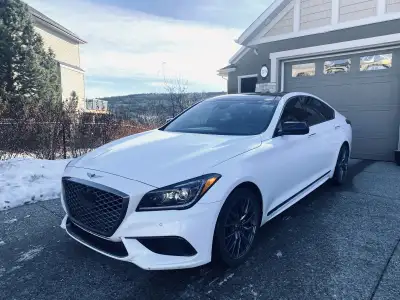 Experience refined performance and luxury in this 2019 Genesis G80 3.3T Sport, powered by a 3.3-litr...