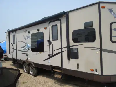 excellent condition, new tires and wheel covers, 15,000 BTU air conditioner, tinted glass all around...