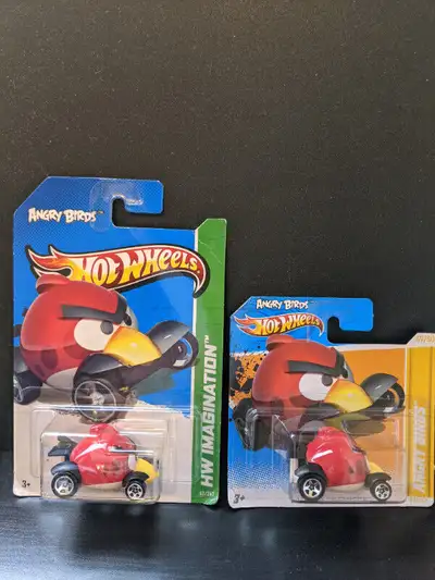 2 ANGRY BIRDS HOT WHEELS -1 yellow & 1 green 1st edition package, View more