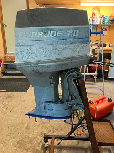Selling 1975 Evinrude 70 hp (no controls or lower leg) Can be seen running.