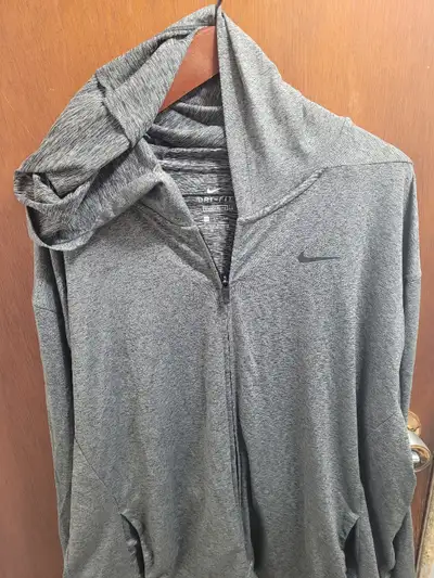 Nike "Dri-Fit" hoodie/jacket (XXL) Gray in color. Has full zipper, as well as 2 outside and inside p...