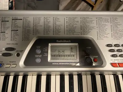 Keyboard Piano and adjustable stand, View more