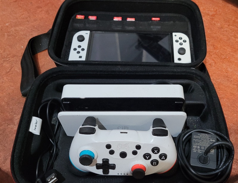 OLED Nintendo Switch with Carrying Case and Controller Nintendo