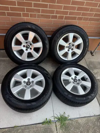 OEM Toyota rims from 2013 Lexus Rx350 and like new tires. Tires are all season Perilli brand. 11/32n...