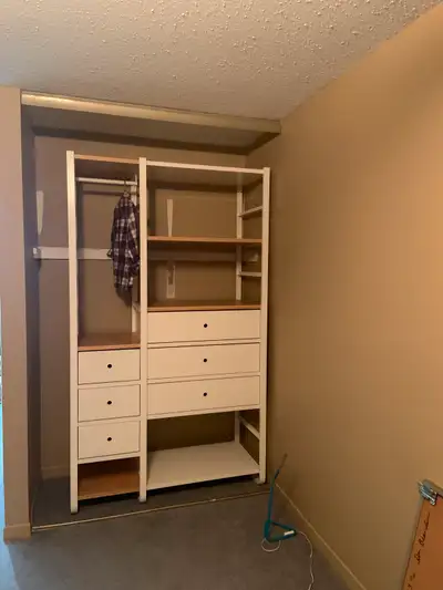 Like new! Two IKEA ELVARLI storage system units. $400/unit. White metal frame, with wood-like shelve...