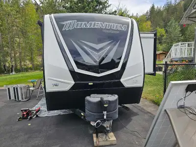 Bought it brand new during Covid. I paid 63k plus tax Has a built in generator, fuel station, patio...