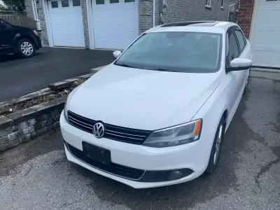 I'm selling a 2013 VW Jetta TDI with low kilometres, offering great fuel efficiency and a smooth dri...
