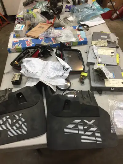Mazda B2200 truck parts --ECM -- Mass air flow -- dist --- ISC controls --- lens ---- center caps --...