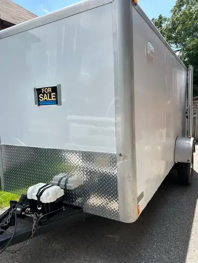 6’x 12’ cargo trailer Rear barn doors, with side person door. LED exterior lights Trailer brakes wit...